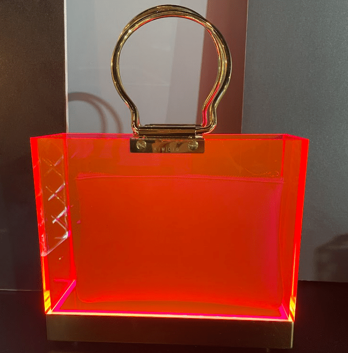 kim cig neon pink glow purse