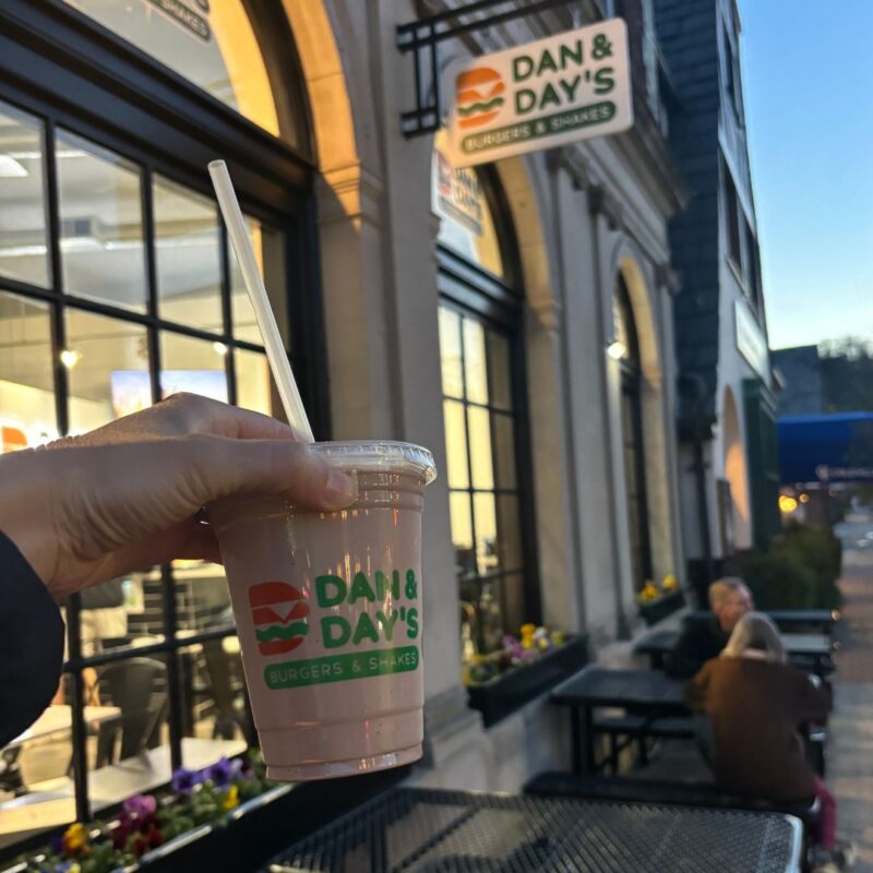 dan + days milkshake in front of the store