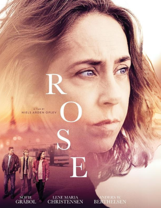Rose movie poster with a woman's face in the background and a small group of people and Eiffel Tower in the bottom left corner